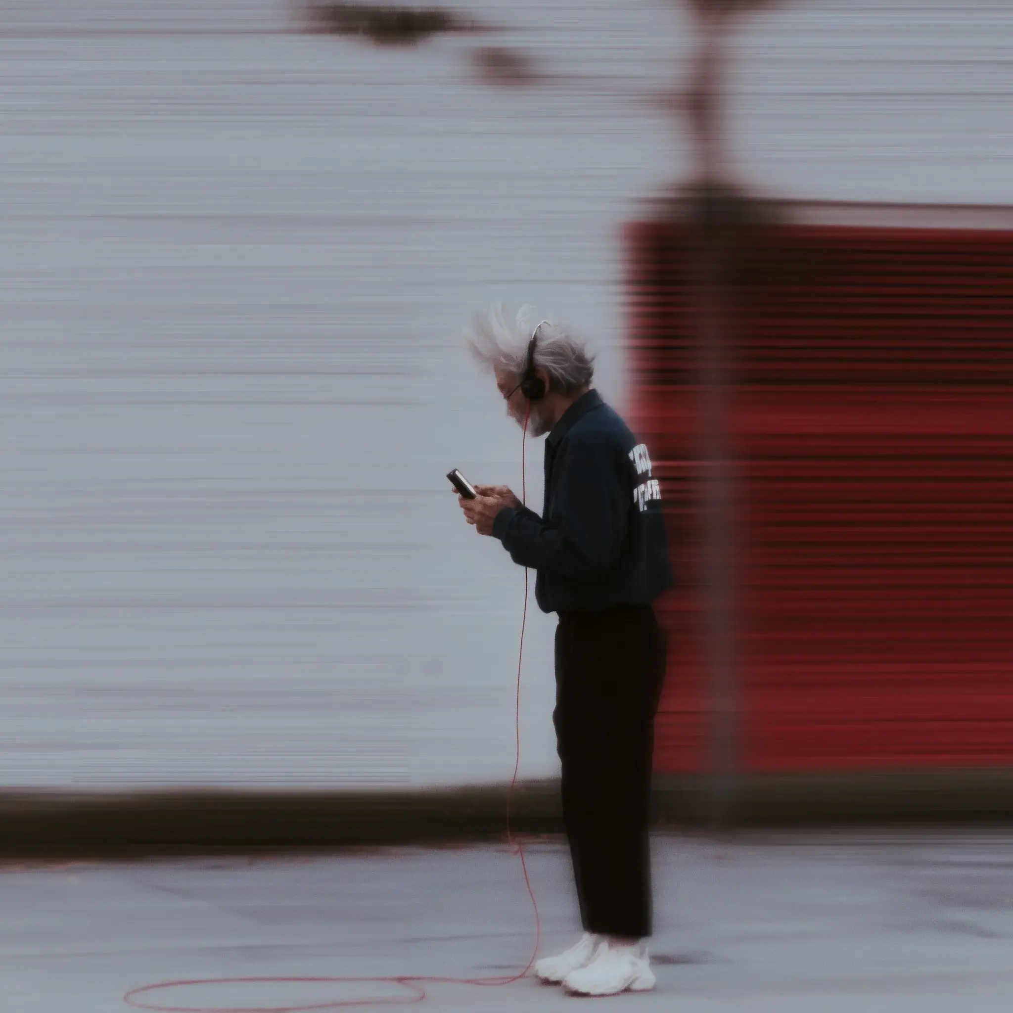 Abstract blurred silhouette of a person walking.